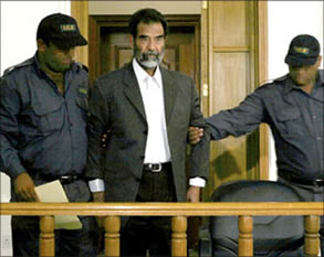 صدام حسين يقدّم للمحاكمة